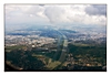 unter den Wolken erscheinen die Donau und Wien